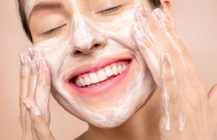 Woman With White Facial Soap on Face